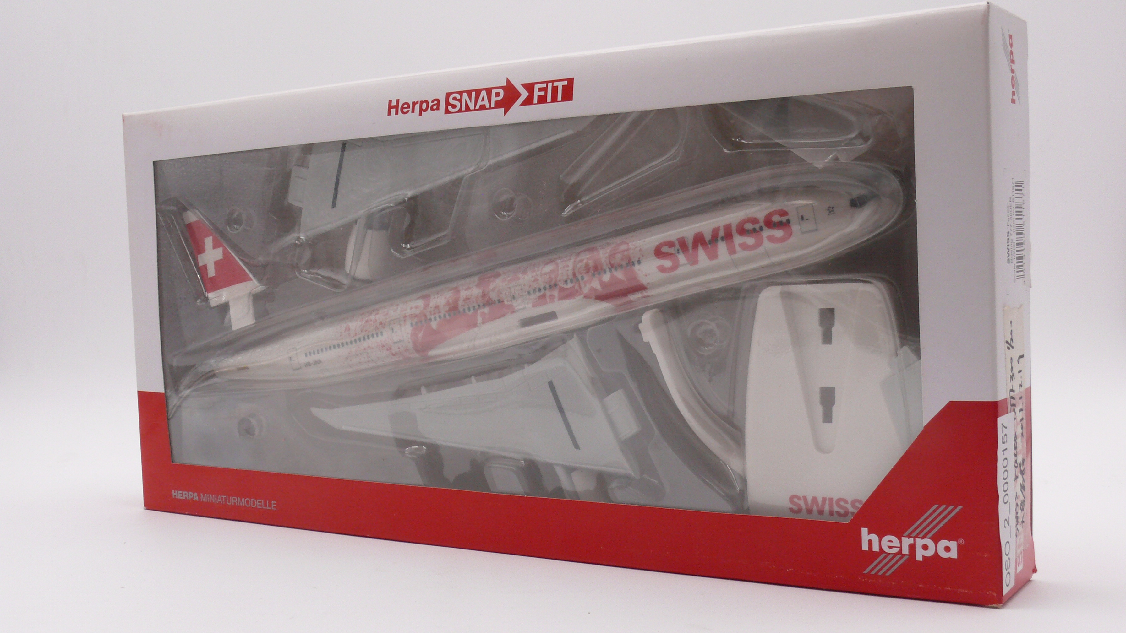 Herpa 611671 Boeing 777-300ER Swiss Airlines "Faces" HB-JNA 1:200